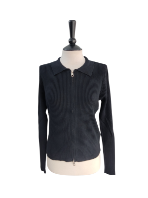 Polo de canalé con cremallera