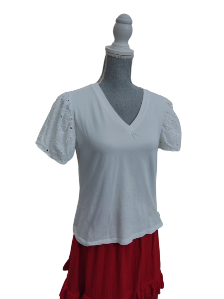 Camisetas básicas volante en manga