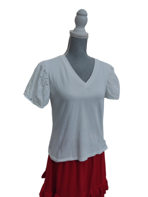 Camisetas básicas volante en manga